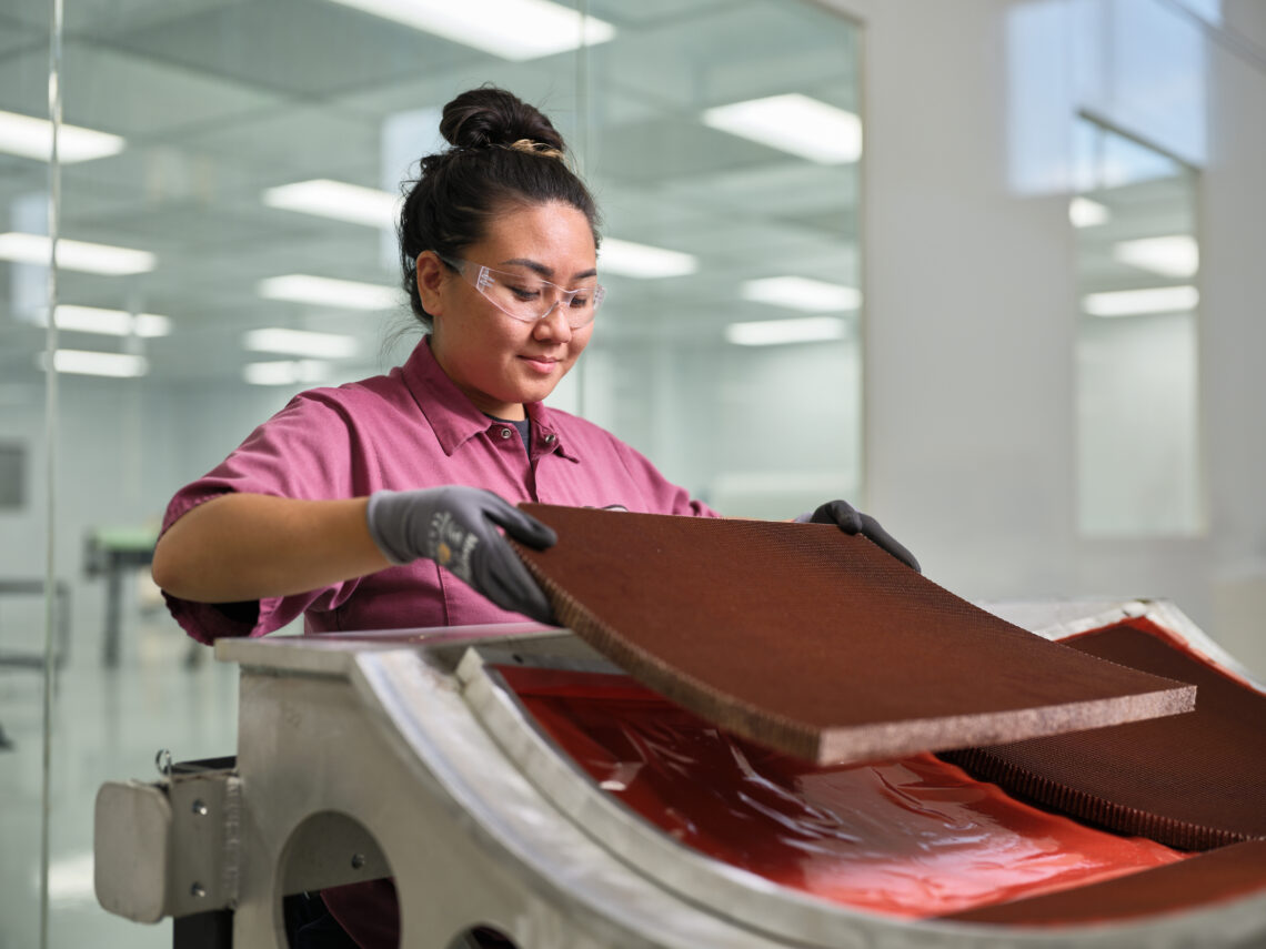 Female Employee Handling Engineered Core Aramid Fiber